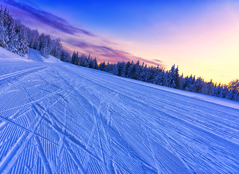 Skating-Loipe bei Sonnenuntergang
